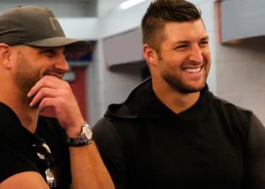 Tim Tebow Tackles Run the Race