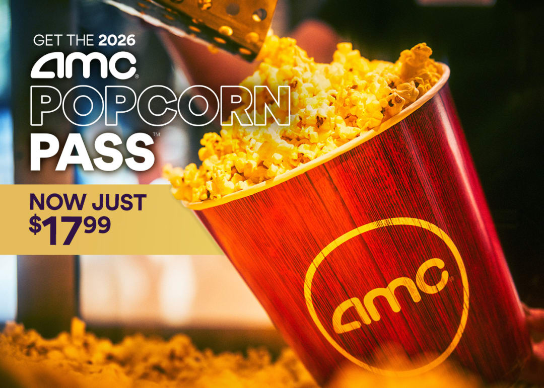 Woman eating AMC popcorn
