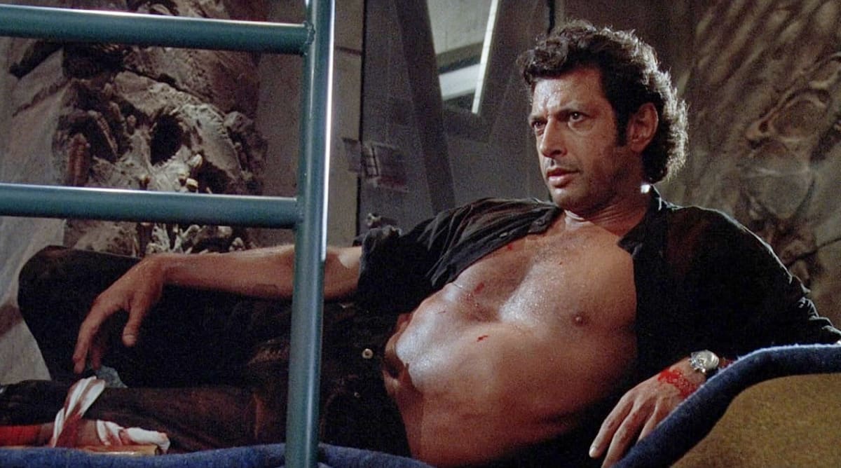 https://res.cloudinary.com/amc-theatres/image/upload/c_fill,fl_lossy,q_auto,w_900/v1/amc-marketing/Jurassic_Park_Ian_Malcolm_wxbtsd