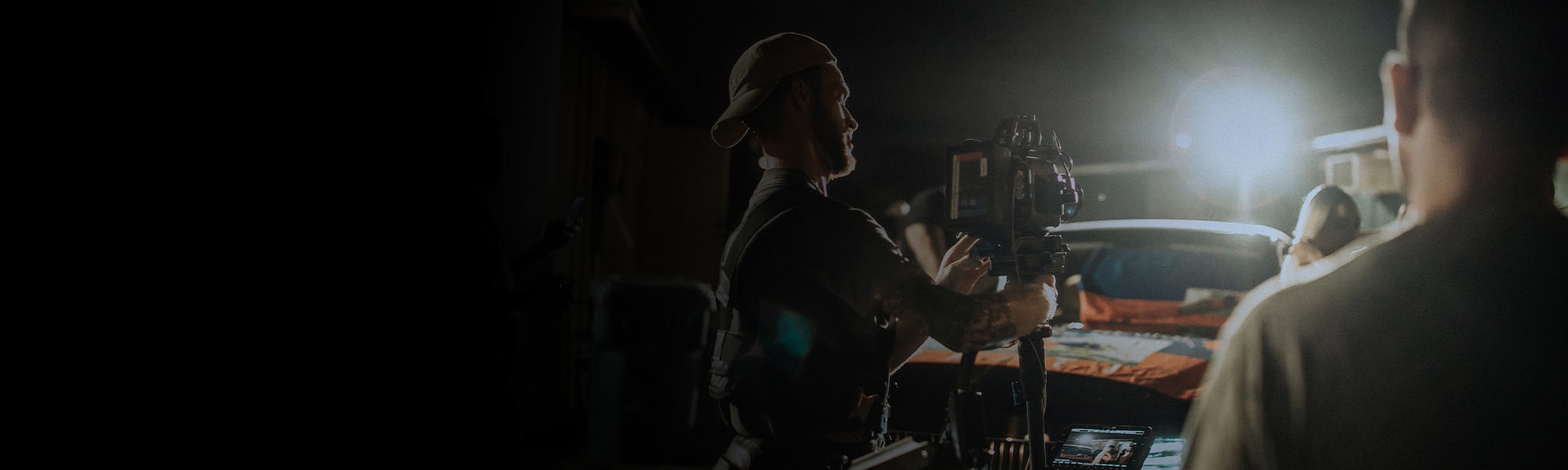 Man operating camera on movie set