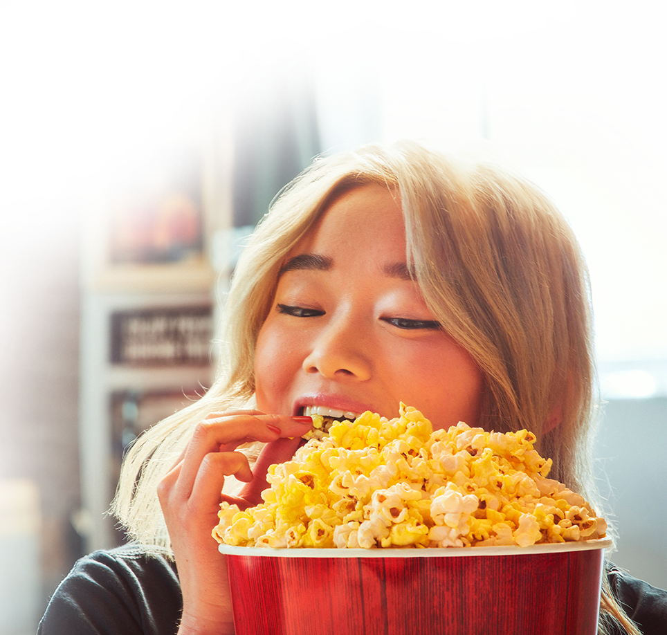 woman eating popcorn