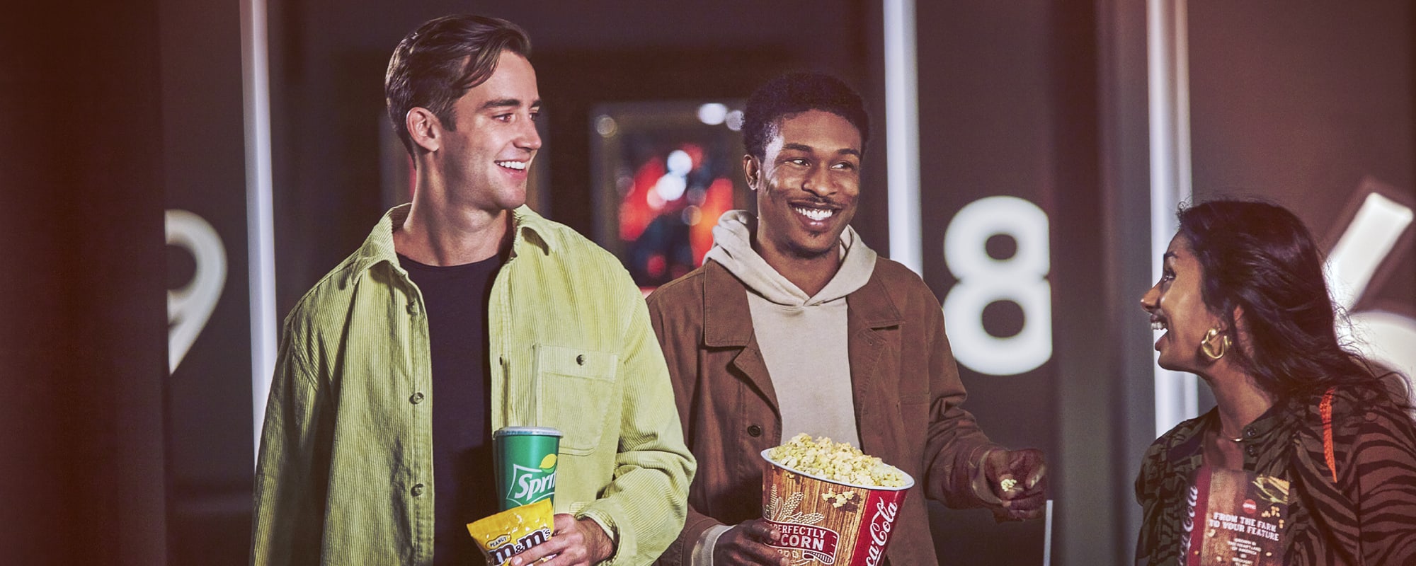 group of people enjoying a movie and concessions